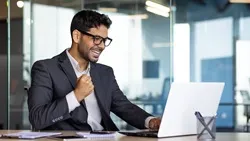 Consultant reviewing documents